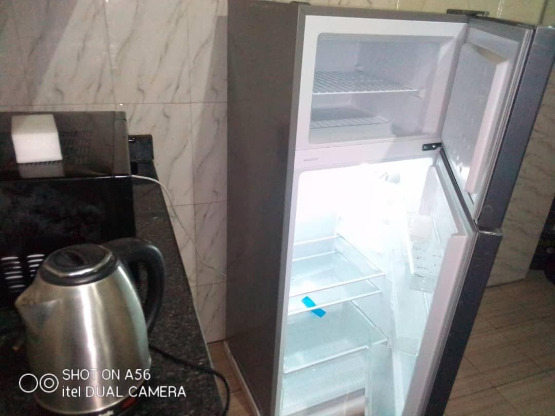 Suitetrails - Unique 1BEDROOM Shortlet Stadium Rd with 24hrs light-FREE WIFI -N35,000