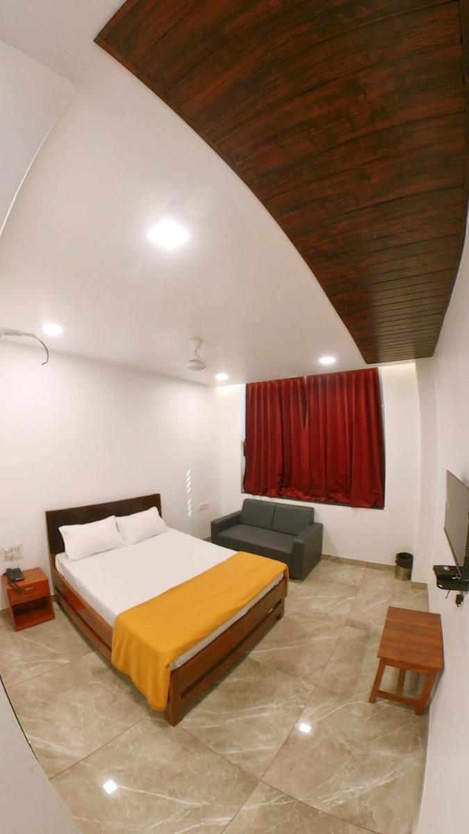 Hotel Nivya Rooms - Housity