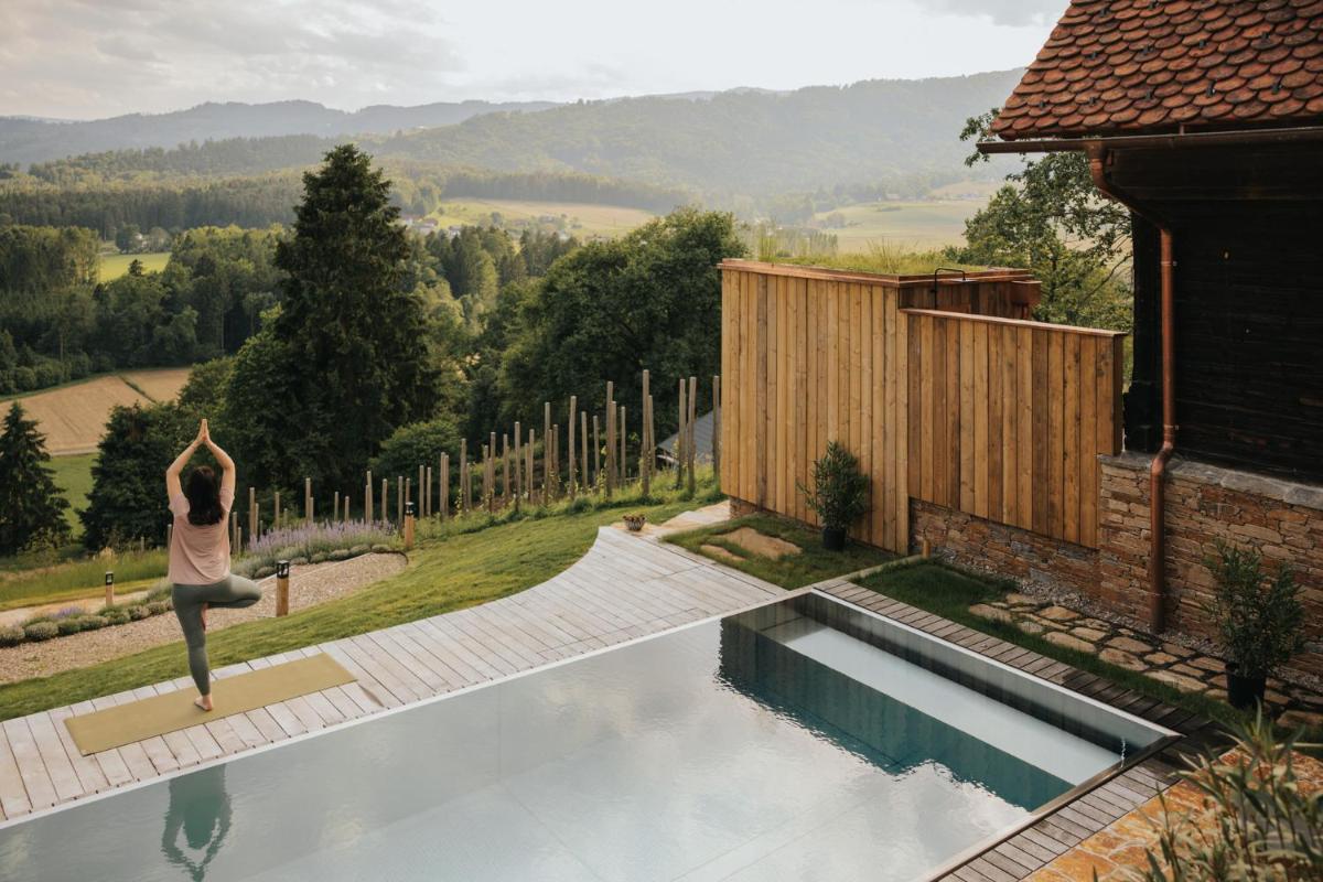 Suitetrails - Am Wildbachberg - Luxus Ferienhäuser mit Infinitypool, Privatsauna und Weinkeller