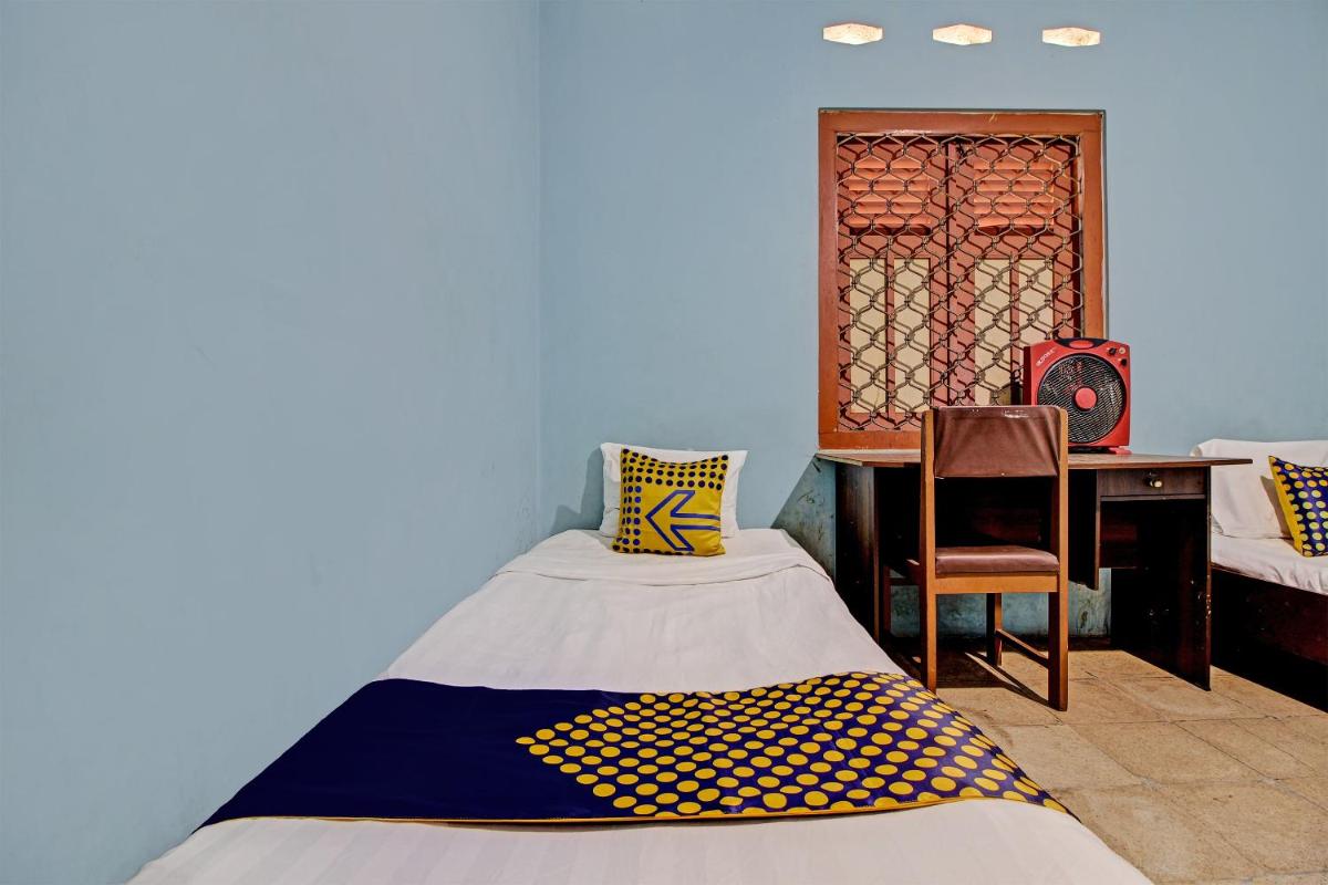 SPOT ON 92763 Hotel Melati Sukoasih - Housity