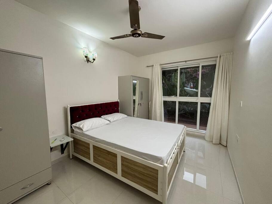 Dazzling Pool Front 2 BHK ,Zennova Stays, 5 Mins from Dabolim Airport - Housity