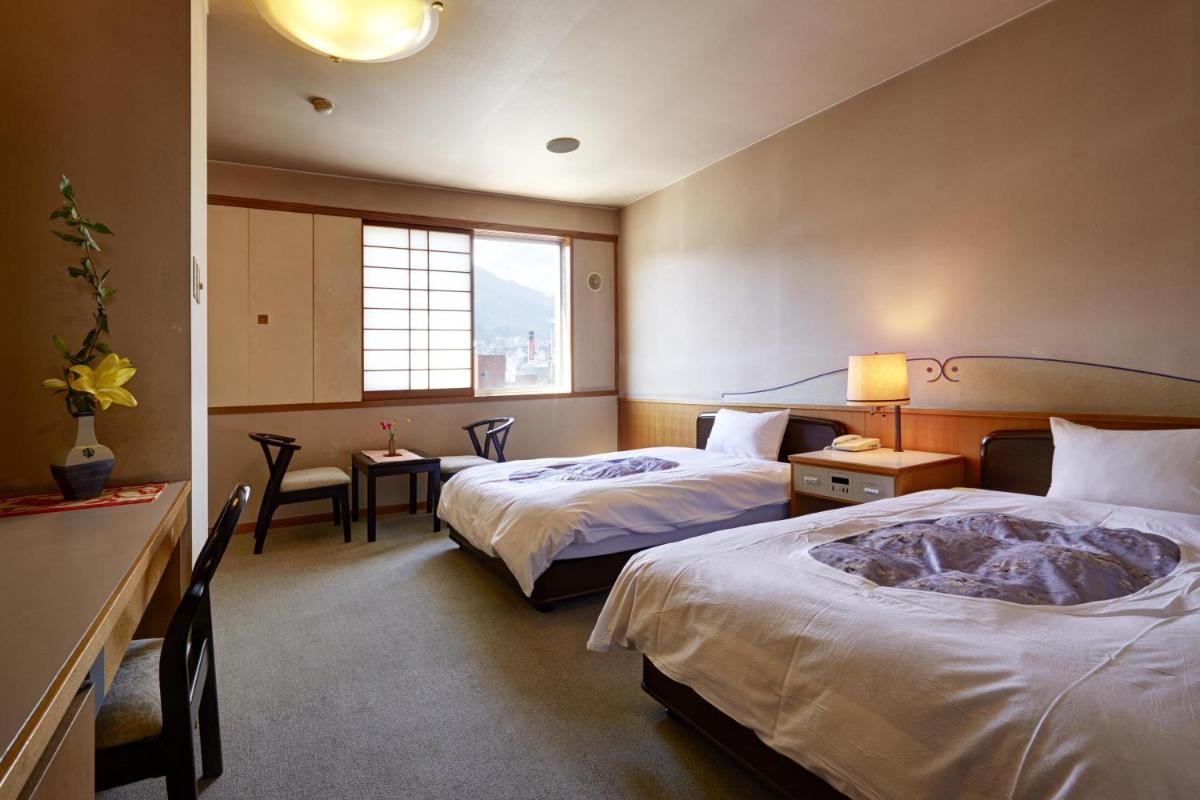 Hotel New Tsuruta - Housity