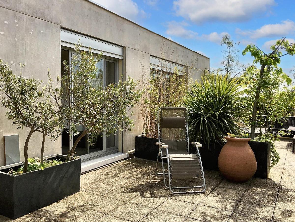 Suitetrails - Appartement de 4 chambres avec vue sur la ville terrasse amenagee et wifi a Paris