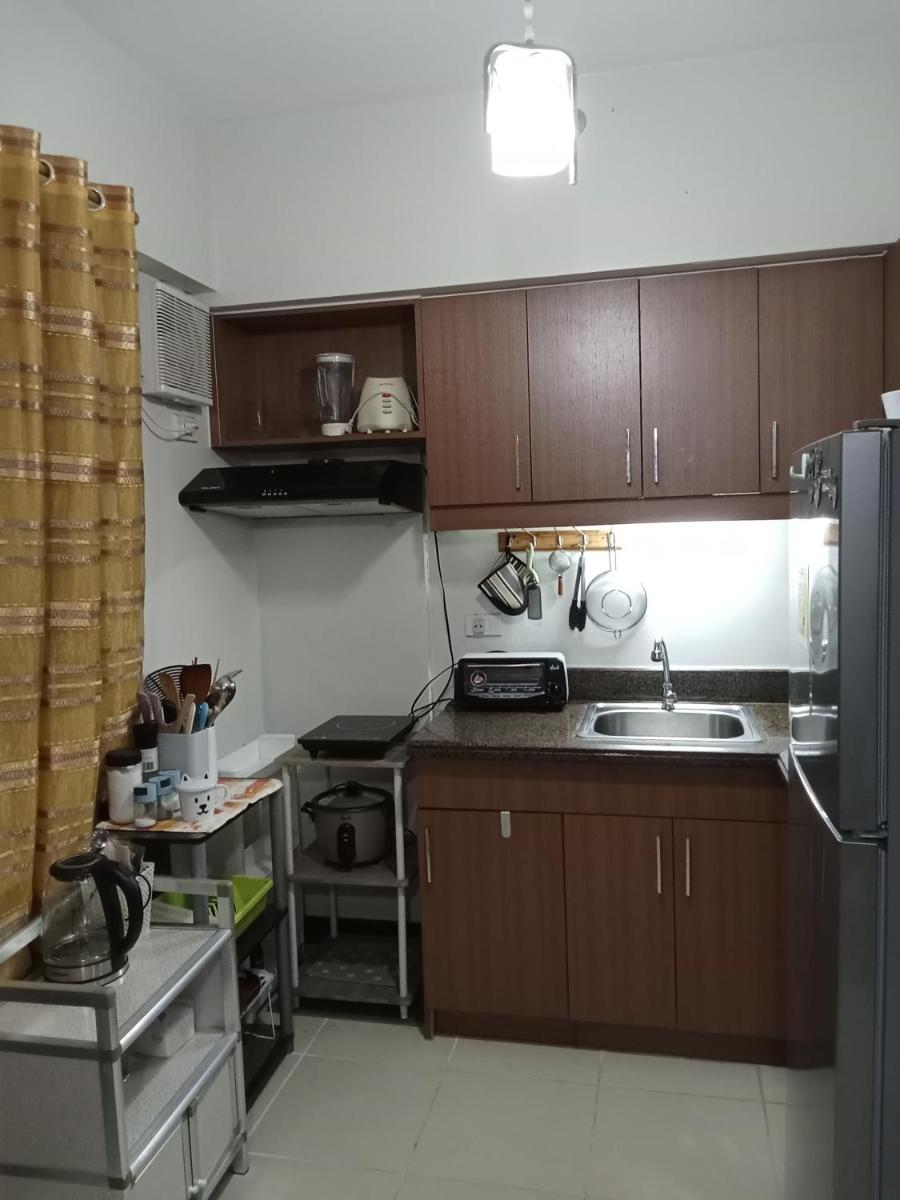 Suitetrails - Rhapsody Residences Mandolin bldg