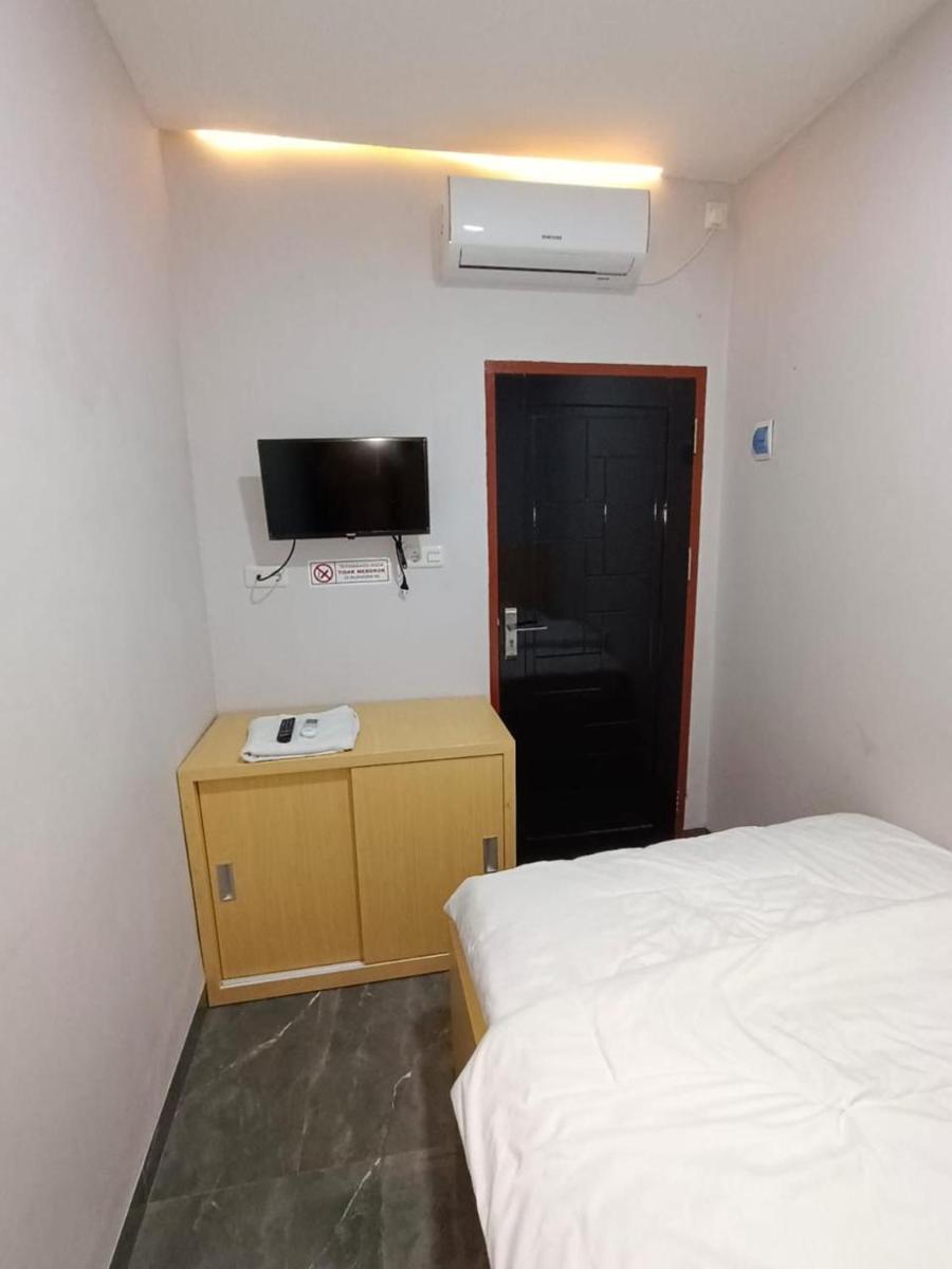 Guesthouse Cempaka - Housity