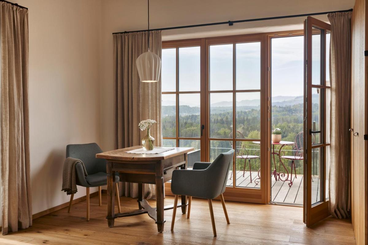 Suitetrails - Am Wildbachberg - Luxus Ferienhäuser mit Infinitypool, Privatsauna und Weinkeller