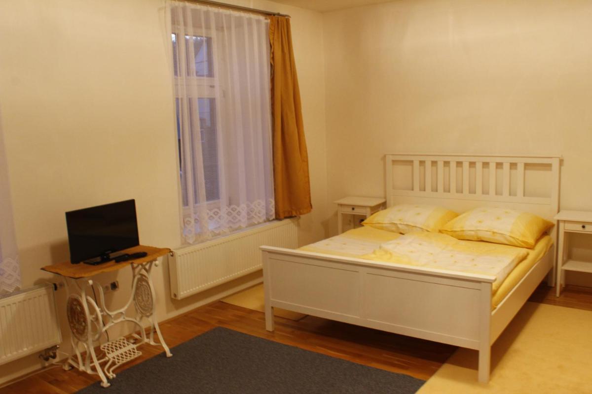 Apartmány na náměstí - Housity