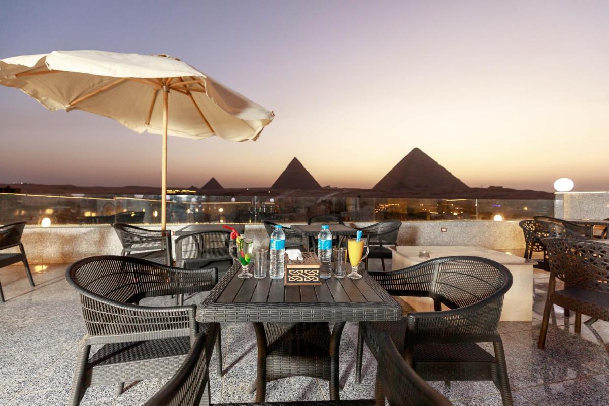 Pyramids Circle INN Middle East View - Housity