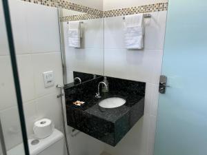 Kylpyhuone majoituspaikassa Pousada Xero