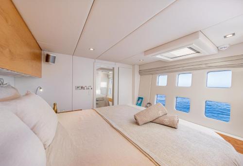 Voodi või voodid majutusasutuse San Blas Sailing boat toas