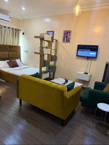 Cozy studio unit in lekki phase 1 - Kitchen, 24-7 light, wifi, Netflix - Apartamento Com 1 Quarto