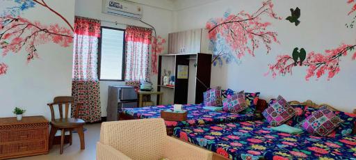 Cherry Blossom FAN ONLY Family Room at Casa Bolo- beach house, 15mins to Hundred Island - Housity
