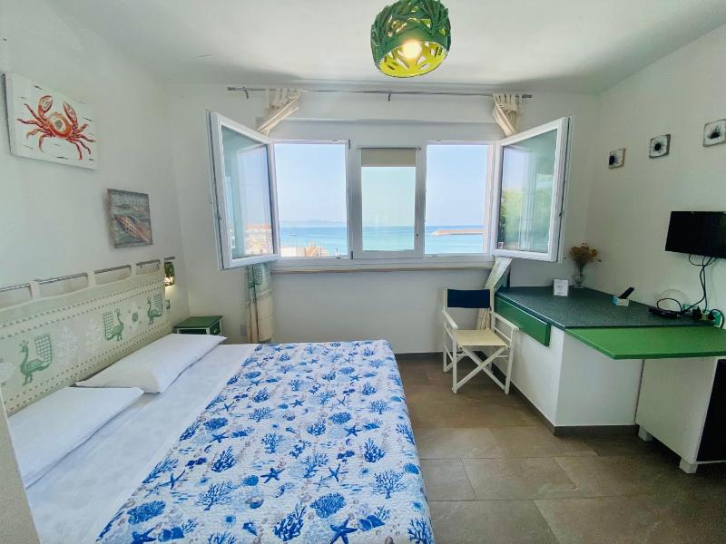 Casetta al mare a Isola Rossa - Accogliente B&B sulla spiaggia